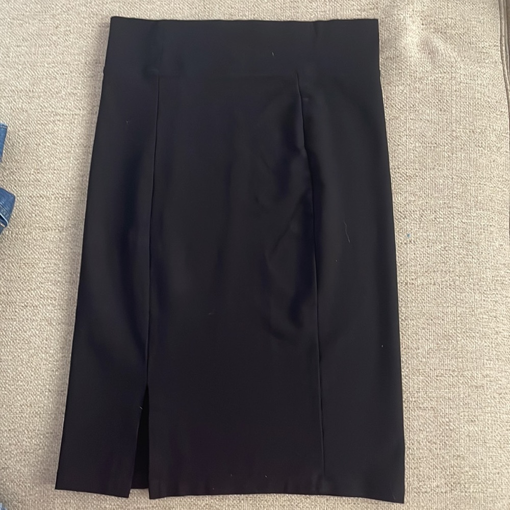 Black skirt. Fairly modest. Worn never. Bought off Amazon but couldn’t return